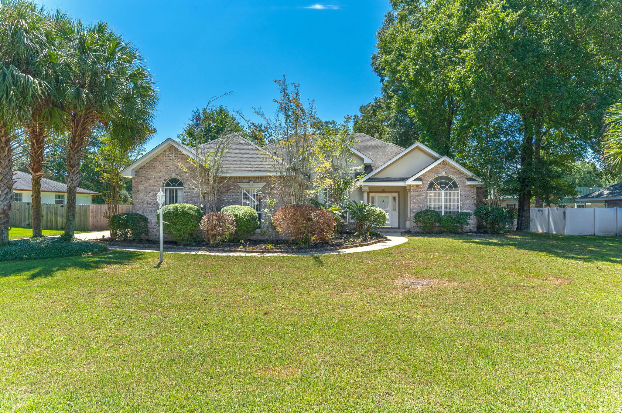 This beautiful home is located in Royal Oaks and offers a functional split floor plan with a master suite, 2 additional bedrooms and a second bathroom. The spacious living room features a cozy gas fireplace. The large master suite has a sitting area and tray ceiling. Attached to the master bedroom is the private master bathroom which features a jacuzzi tub, separate walk-in shower, and large walk-in closet. This property also has a sunroom and a fenced in back yard for privacy. The shed buildings in the back convey with the property. Washer and dryer are also included. HVAC 2021; Seller willing to pay off solar panels at closing.Assumable VA loan at 3.125%!Lot and room dimensions to be verified by buyer.