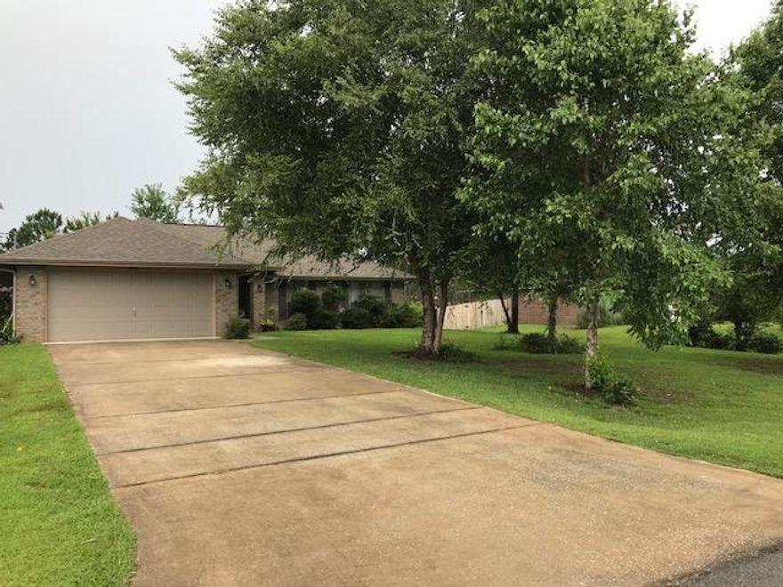 Move in ready! Come see this well maintained brick home featuring a split floor plan with a spacious great room and new granite counter tops and stainless steel appliances. Enjoy relaxing in your large screened porch and the separate 20x16 workshop. Both front and rear yards are well landscaped and both have complete irrigation systems. Backyard is privacy fenced. Take advantage of the amenities of Holley By The Sea including use of the recreation center, fitness center, tennis courts, 3 pools and more.