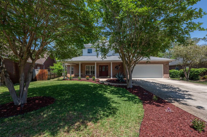 Looking for a home like no other, sound front neighborhood, and maybe a pool? This home offers it ALL, from curb appeal to a saltwater pool, master bedroom on the first floor, plus office and two living areas. . . this home is a MUST see! Driving up you will notice the mature trees and large front porch with swing. As you enter the home you will be welcomed by the 27ft ceiling, beautiful hardwood floors and staircase leading up to the two guestrooms and built in bunkbeds. passing through the living room, you will enter the dining & kitchen areas. The kitchen has new quartz counters that contain recycled glass, farmhouse sink, 42in. maple cabinets & stainless-steel appliances. Pass through the dining room and enter the newly fully enclosed Florida room which added 372sqft of