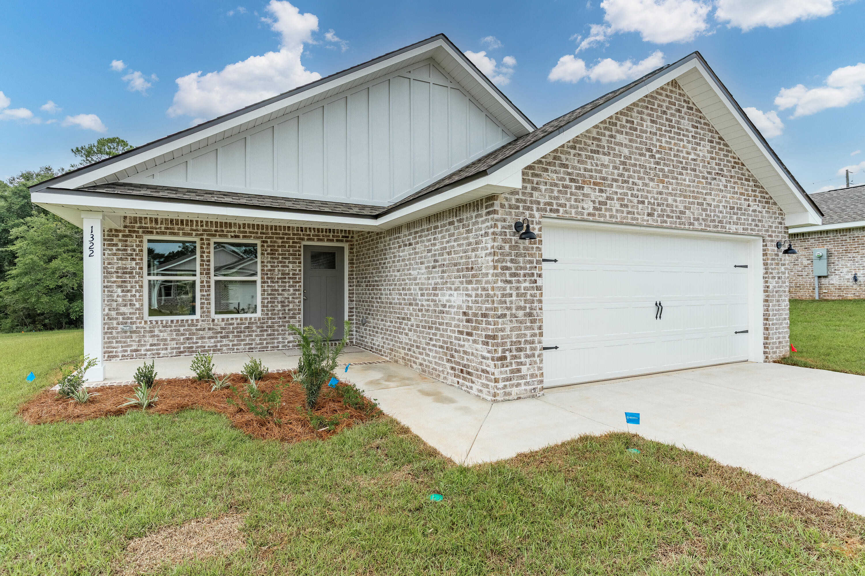 $15,000 TOWARDS CLOSING COSTS/PREPAIDS/RATE BUYDOWN - Ready Now - No HOA - Fully landscaped yard w/sprinkler system. Welcome home to this beautiful new all brick home featuring front and rear covered porches. Standard features include raised ceilings in main areas, luxury vinyl plank flooring, ceiling fans in all bedrooms/family room, recessed lighting, quartz countertops. Open family/dining/kitchen features work island with bar seating, pantry + cozy dining area. Split bedrooms w/owner's bath featuring double vanities, walk-in closet & shower only. Finished garage with pull down- stairs for storage. Photos of similar completed home, front elevation/interior/exterior colors will vary.