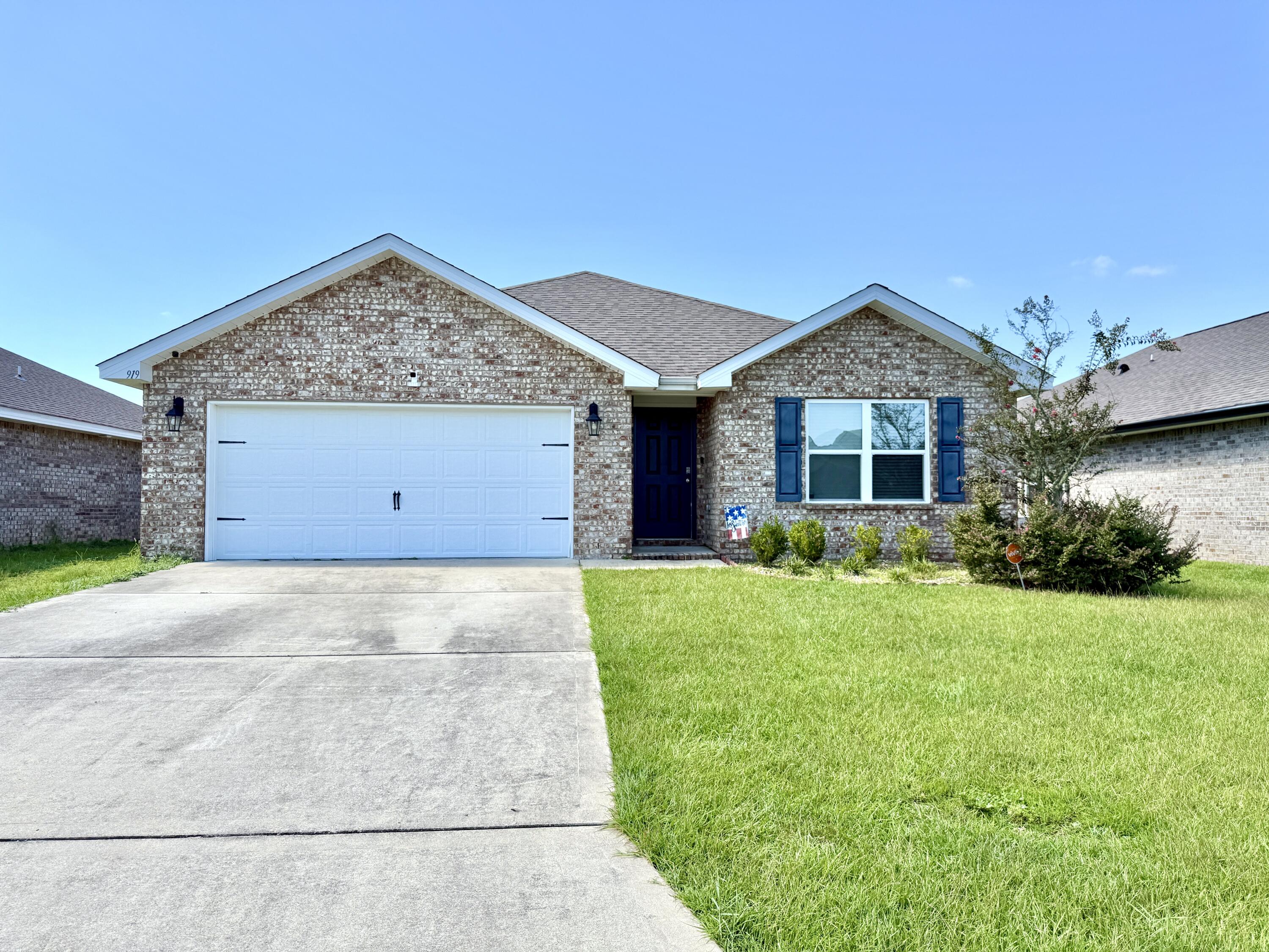 Available 8/25/2025.....High desired Redstone Commons features this 4/2 floor plan with easy access to beaches, bases, and shopping. Great curb appeal invites you to explore this wonderful home in a pool community. Enjoy your summers visiting the pool without the responsibility of pool maintenance. Local dog park for the fury friend and playground. This home features LVP throughout the home, neutral paint granite in the kitchen with a stainless appliance package, corner walk in pantry, and large laundry space. Eat in kitchen/dining area and spacious living room. The kitchen island boasts open concept living with a breakfast bar for morning coffee. 4 spacious bedrooms and bathrooms. Nice foyer upon entry. No inside smoking or vaping. Pets allowed with approval.