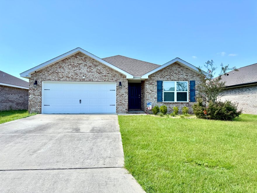 Available 8/25/2025.....High desired Redstone Commons features this 4/2 floor plan with easy access to beaches, bases, and shopping.  Great curb appeal invites you to explore this wonderful home in a pool community.  Enjoy your summers visiting the pool without the responsibility of pool maintenance.  Local dog park for the fury friend and playground.  This home features LVP throughout the home, neutral paint granite in the kitchen with a stainless appliance package, corner walk in pantry, and large laundry space.  Eat in kitchen/dining area and spacious living room.  The kitchen island boasts open concept living with a breakfast bar for morning coffee.  4 spacious bedrooms and bathrooms.  Nice foyer upon entry.  No inside smoking or vaping.  Pets allowed with approval.