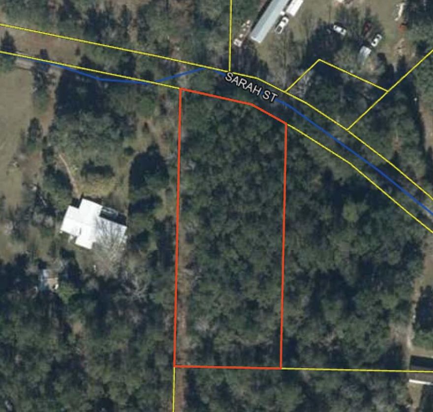 Great location!!! Come build your dream home. Secluded and only a mile from town.  Survey available.  Sewage and Water is available but impact fees have not been paid.  West end of property backs up to hammock bay sports complex.  Buyer to verify all information including dimensions.  Zoning is municipal.