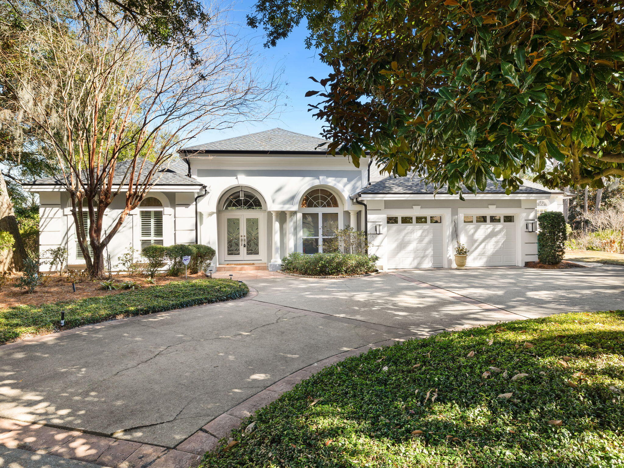 Exquisite custom residence offering breathtaking bay views! Located at the end of a serene cul-de-sac on one of Kelly Plantation's most sought-after streets, this remarkable four-bedroom, three full and two half-bath home exemplifies luxury living. With impeccable attention to detail, the home features soaring ceilings, crown molding, recessed lighting, polished tile floors, granite countertops, and recently updated stainless steel appliances. The thoughtful floor plan seamlessly blends spaces for both sophisticated entertaining and relaxed, everyday living.Upon entering, you are welcomed by a foyer opening to the formal dining room on the right, offering ample space and built-in china and crystal storage. The formal living room's sliders open to the screened lanai and pool area. A private office, complete with custom built-in bookshelves, and a powder room are also conveniently located just off the foyer to the left. The gourmet kitchen is a chef's dream, boasting stunning bay views, abundant cabinetry, gleaming granite countertops, a center island, and a suite of updated stainless-steel appliances, including a gas range. The kitchen flows effortlessly into the breakfast area and spacious family room, creating an ideal space for family gatherings and entertaining. There is also direct access to the lanai, making alfresco dining a breeze.

A second master suite is designed with luxury in mind, featuring access to the lanai, dual walk-in closets, and a spa-inspired bath with a large walk-in shower, jetted tub, double vanity, and a private water closet. Two additional generously sized bedrooms share a well-appointed full bath, creating a thoughtful split-bedroom floor plan.

The laundry room includes a customized pantry with triple-door access, perfect for additional storage and access to the garage. The pi??ce de r??sistance is the stunning Grand Master suite addition, a true sanctuary. This luxurious retreat features a spacious bedroom, a spa-like bath with his and hers customized walk-in closets, two vanities, a private water closet, an oversized walk-through shower, an Air Jet tub, and custom cabinetry with pull-out drawers and electrical outlets.  An additional large closet enhances the suite's functionality. With two master suites, this home could be ideal for multi-generational families. A powder bath off the hall offers convenience for guests, and French doors lead to the extraordinary screened outdoor living area.

The outdoor space is nothing short of spectacular, complete with a summer kitchen, a large seating area, paver flooring, a stacked stone accent wall with a granite countertop, and a fully equipped kitchen with a large stainless grill, sink, refrigerator, ice machine, and a mounted flat-screen TV. Two covered living areas are separated by the sparkling pool, creating an ideal space for both relaxation and entertaining.

The Sellers recently put on a new roof, painted the exterior, installed new impact windows, and garage doors, and much more. For a full list of updates and improvements, please refer to the documents. The whole-home, natural gas generator offers peace of mind in case of power outages. Enjoy the benefits of electric vehicle charging at home with the electric vehicle charger in the garage as well. 

The property's prime location also offers direct access to the community's private boardwalk leading to the Bay. Enjoy the many amenities Kelly Plantation has to offer including clay tennis courts, pickleball courts, two playgrounds, a community garden, the public golf course and golf clubhouse with on-site restaurant, an exercise facility with weekly classes, an Owners' Clubhouse for meetings and events, along with a covered seating and outdoor grilling area overlooking the community pool. 

Buyers will love the convenience to all Destin has to offer including shopping, local restaurants, beaches, and more. 

*All dimensions and information deemed important should be verified by the buyer.
