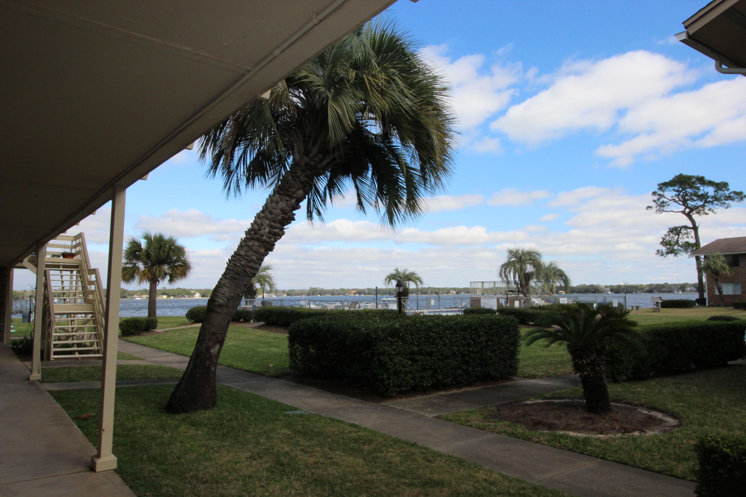 BEST PRICE ON THE BAY! Great opportunity to own at a fantastic well-maintained waterfront complex! This two bedroom, one bath unit at the popular Bayview Waters offers a spacious living room and tile throughout for easy upkeep! Sit on your patio and enjoy the peaceful view of the water and surrounding landscaping. The community features a lovely pool, a boat dock, waterfront picnic tables and grill stations, and well-kept grounds. The complex sits on the Choctawhatchee Bay where you can enjoy fishing, kayaking, paddle-boarding, and crabbing. All of these activities right at your own home - perfect for an active lifestyle! Priced to sell, so don't miss out! Call today!