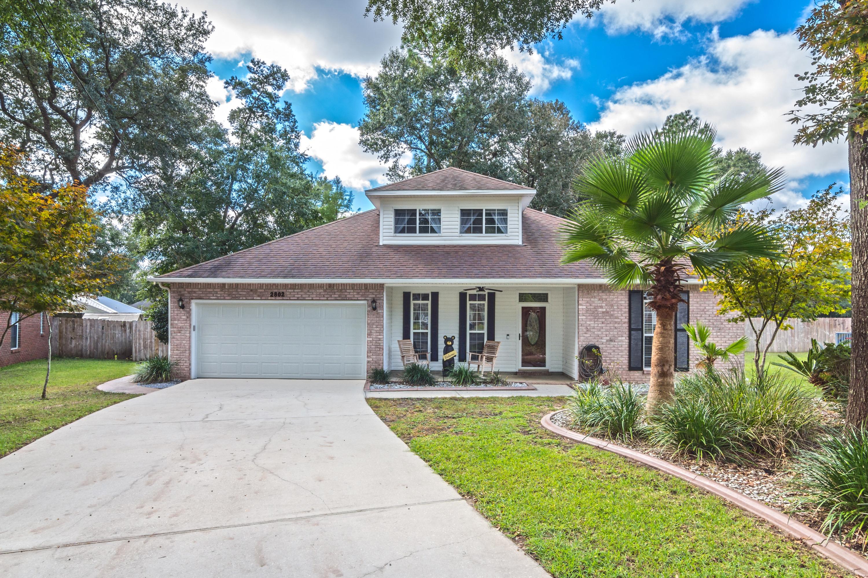 Spacious cul-de-sac home now available in South Crestview! This 4 Bedroom, 2.5 bath, 2 story home features 2,359 square feet. Home is a convenient 5 minutes to Duke Field; 10 minutes to 7th Special Forces; 25 minutes to Eglin AFB.Back yard features a large 10 x 20 storage shop that has French doors, is insulated, drywalled, wired for electrical, crown molding, ceiling fans, window AC unit and water hook up. Current owners use it as a dog grooming station. 10 x 20 attic space above with convenient pulldown stairs. There is also an attached 6 x 20 covered front porch that leads from the back of home with a flagstone and rock walkway. Shop would be great for a small business owner, a man cave or just work shop to tinker in! (continued)
