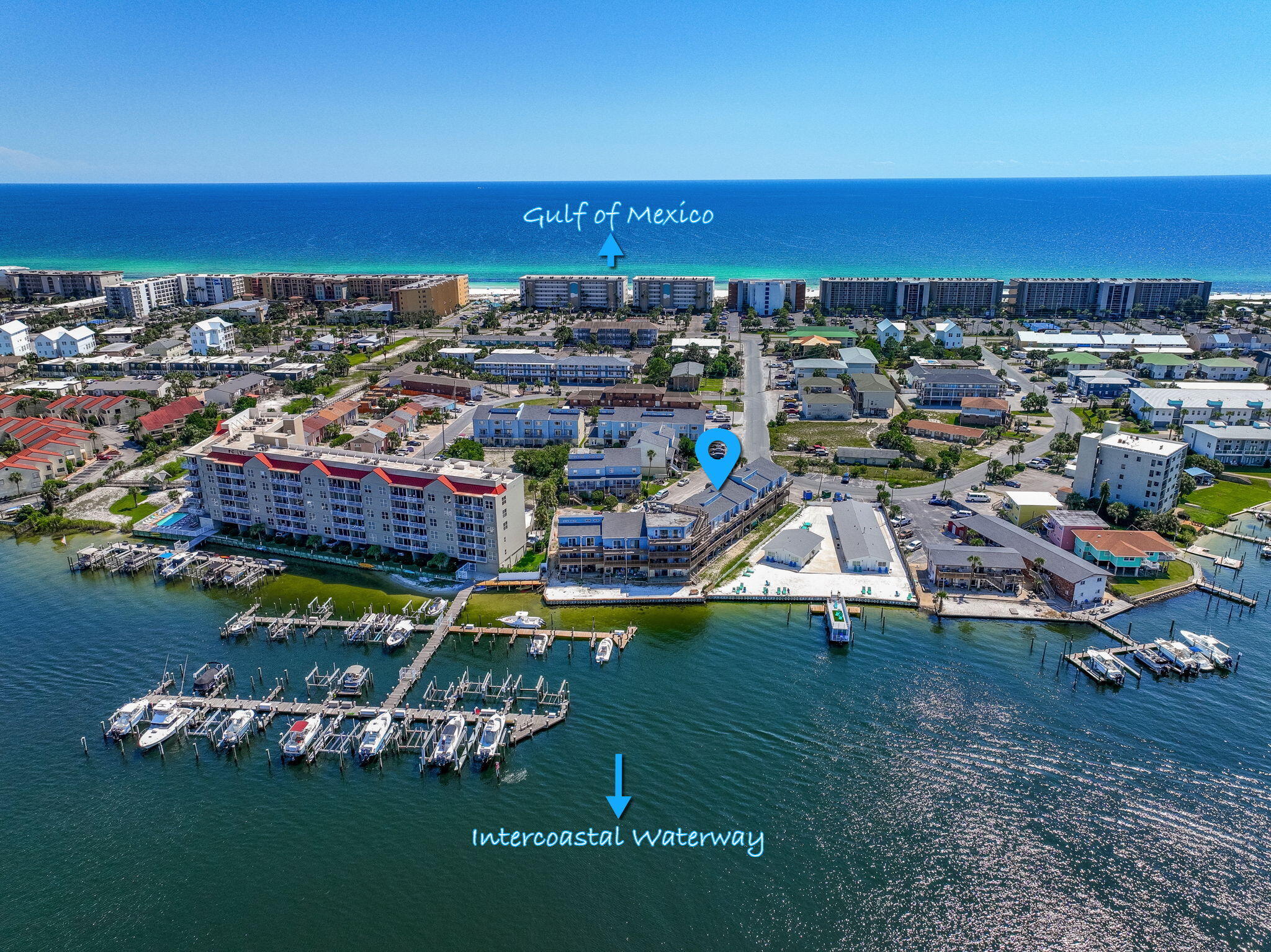 TOP FLOOR WITH SWEEPING VIEWS OF THE INTERCOASTAL! Come see this 2 bedroom 2 1/2 bathroom condominium on the coveted Okaloosa Island. As you step inside, you are greeted by an open kitchen/dining/living room with views of the intercoastal. The kitchen is completely modernized with shaker cabinets, quartz countertops, farmhouse sink and stainless-steel appliances. The beautiful kitchen is open to the living and dining room which connect to the large balcony with beautiful water views. On the main floor, you will conveniently find a half bath and laundry closet with washer and dryer and room to store your beach toys. Upstairs are two full bedrooms, both en-suites. The master bedroom has its own private balcony with more gorgeous views of the intercoastal. Need an office space or a game room? There is a loft with plenty of space for a home office or entertaining area for the children. No carpet in this home...all luxury vinyl plank flooring throughout. Additional modern touches like barn doors, updated bathroom vanities, crown molding and no popcorn ceilings add to the modern feel. Step outside and take a dip in the community pool or walk to the public beach access .3 miles away. While this unit is being used as a vacation rental, it would make a great primary residence also with space for guests and home office. You can watch the Billy Bowlegs boat festival from the comfort of your deck! Okaloosa Island is a fabulous place to bicycle, jog, fish or enjoy the Gulfarium or many shops and restaurants. HVAC and Water Heater are both 2022