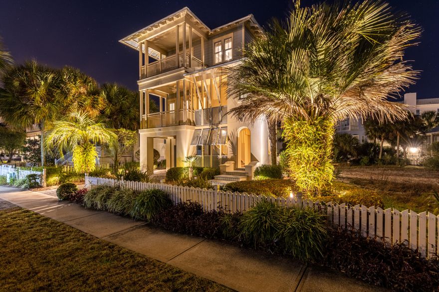 No expense was spared on this custom lake-front home in the highly sought-after community of Destin Pointe! This home has been meticulously maintained with acute attention to detail. Tiled mosaic steps lead you to the second-floor entrance with a large covered porch. All bedrooms are located on this floor and have an ensuite bathroom. The first bedroom has access to the front porch and bathroom has a tiled shower and vanity with quartz countertop. The bunk room sleeps four and has a beautiful free-standing tub with tiled wall surrounds. The spacious master bedroom boasts a private balcony overlooking Lake Christina, with wainscoting and a charming window bench with storage. The master bath offers a tub and tiled shower and is complete with a walk-in closet. The