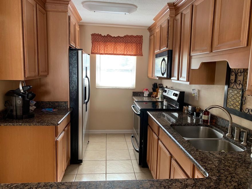 Awesome view of the Bay & Pool. Rare find 2 bedroom, 2 bath condo with a boat slip. Excellent condition. Granite, tile through out,ceiling fans, New kitchen - wood cabinets, ceramic top stove, double stainless sink with sprayer. Ref with new appliances, new hot water heater, new A/C, Nicely painted, Updated bathrooms, Tiled porch with a great view of the Bay. Residents only, Quiet Community. Heated swimming pool,shuffleboard, community room, laundry facility, storage, car wash, boat storage, assigned parking, lushly landscaped. Low association fees. shuffle. Rented till the end of July 2019 at 1250.00 a month.New pilings put on the dock. ready if you want to put a lift in. Buyer to verify any and all dimension