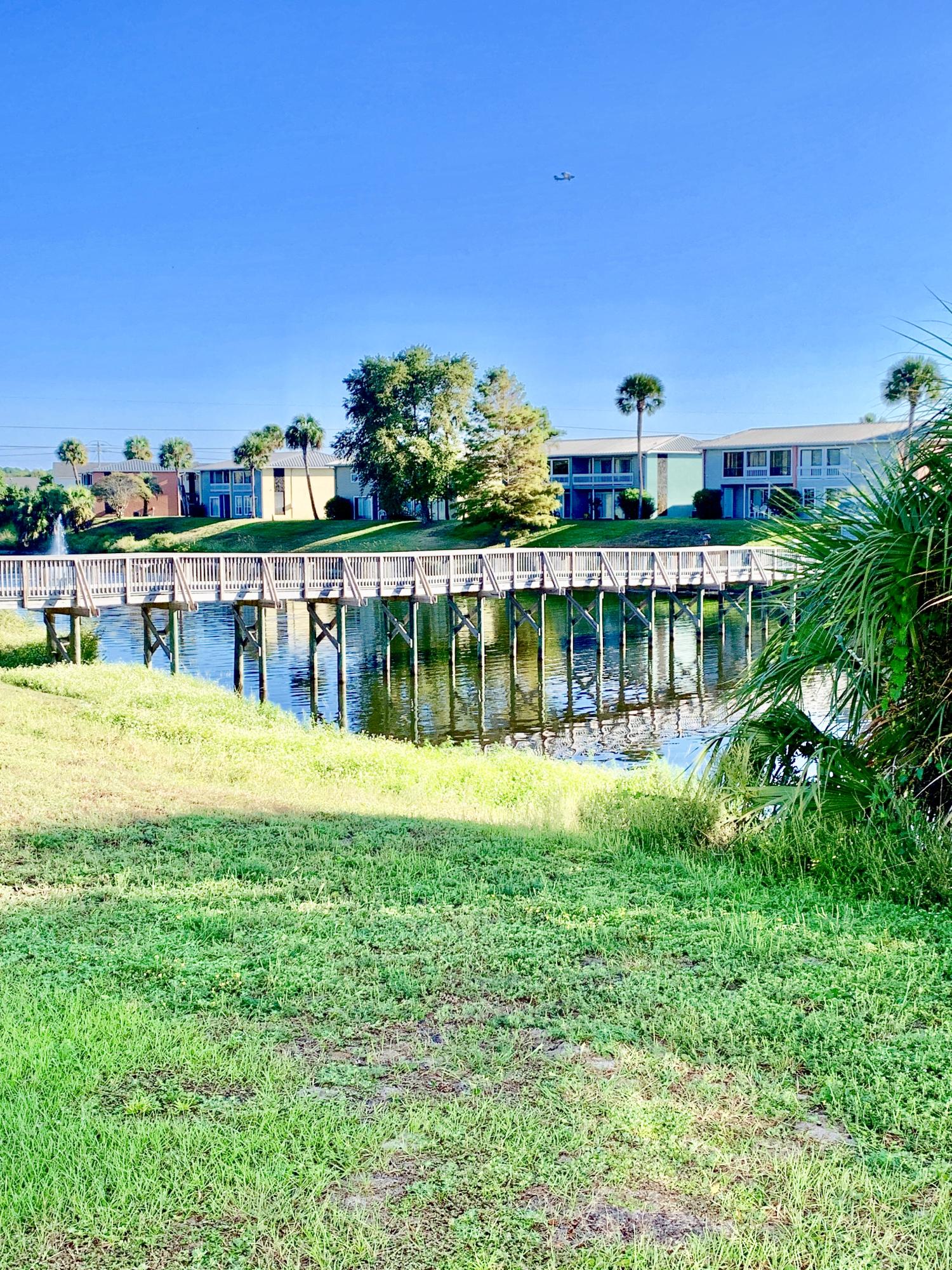 REO. 1st Floor Ground Unit with Lake & Pool Views. Tile Floors in Unit. Patio was enclosed to provide an indoor Laundry Area and additional living space. Located in the Heart of Destin, close to shopping, restaurants and the Beautiful Beaches of the Gulf of Mexico!