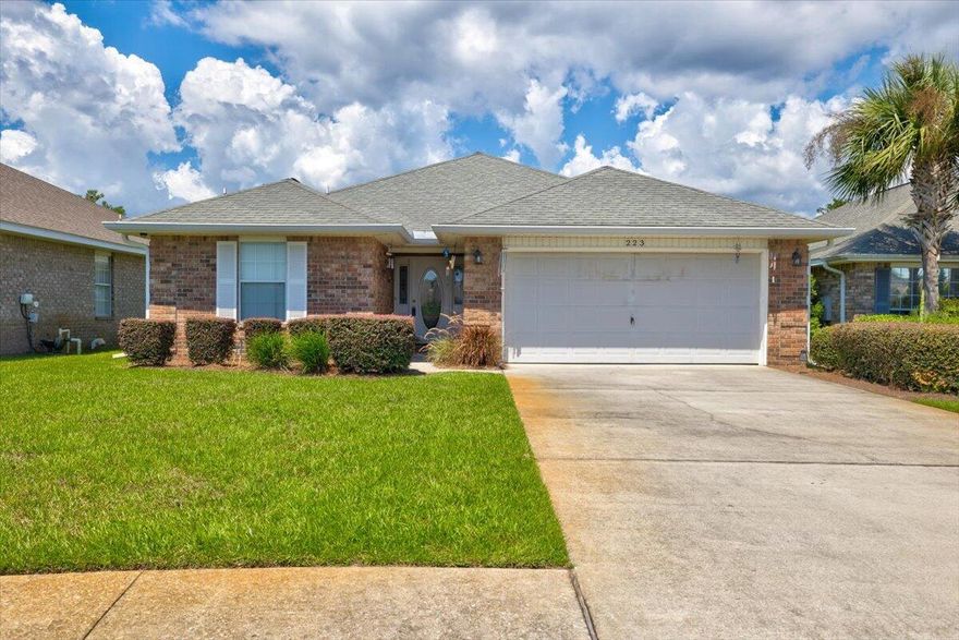 Paradise Retreat, a gated community has 320 feet of private deeded beach access, and two entrances (north and south. SHORT-TERM RENTALS ALLOWED.  This lovely 1-story brick home with 2 car garage has had 1 owner since construction.  The home features a patio and large lot (51'x 140'); the backyard has space for a home addition and/or a pool.  The home is in proximity to the private gated beach access with two walkovers. This home features 3 bedrooms, 2 bathrooms, tile entry foyer and kitchen. The great room is spacious with vaulted ceilings and electric fireplace. Kitchen has bleached oak wood cabinets with a breakfast bar and pantry, Primary bedroom with ensuite has dual vanity sinks, garden tub with separate shower.  Seller is offering a $3,000 flooring allowance.