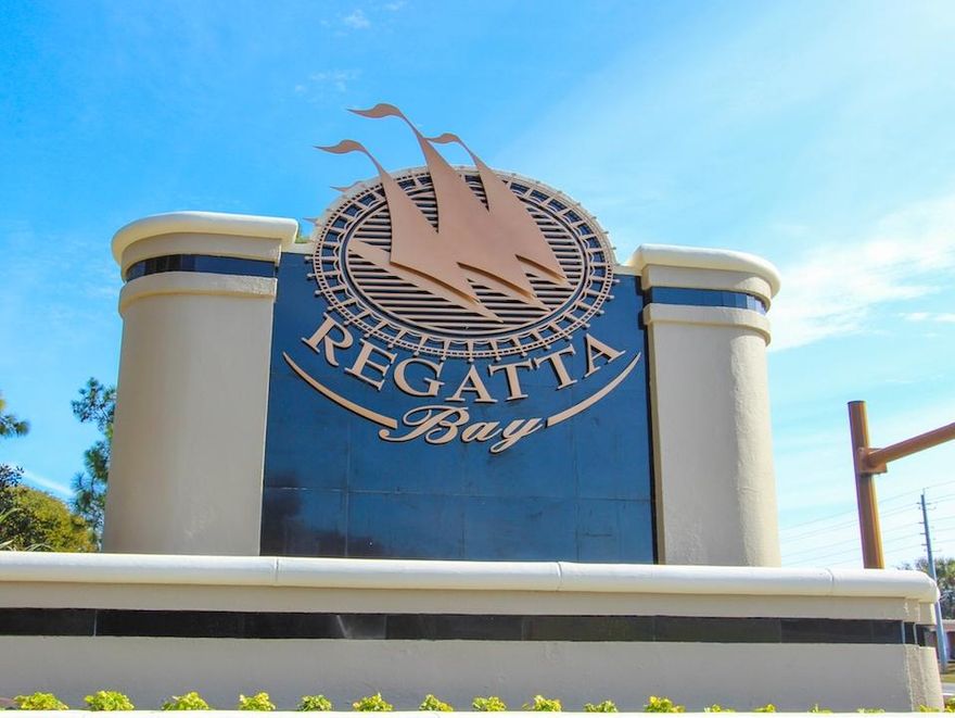 Stunning updated home located within the gated golf course community of Regatta Bay. As you enter the front door you will be impressed by the vaulted ceilings, tile floors and custom wood features that have been added to the home. First floor offers an office with custom shelving, master suite, open living area with breakfast nook, kitchen, separate dining area, laundry and 2 car garage with a screened in porch. 2nd floor has an open area for entertainment with mini bar area and 2 additional bedrooms with 2 baths.