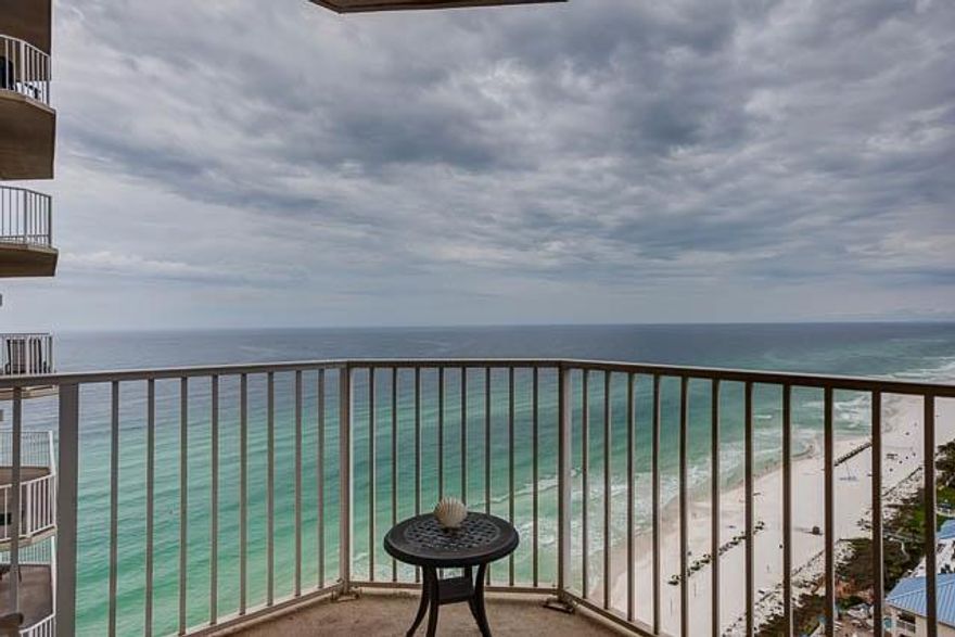End unit views for a 2 bedroom price!! Spectacular 180 degree gulf, sunset and coastal views from this beautiful two bedroom condo. Quiet location on the far West end of the building with only two condos located in this hallway. Open concept with 9' ceilings, tile, granite, a breakfast bar, and crown molding. Tastefully decorated, fully furnished and rental ready with all appliances including a stack washer/dryer. Tidewater Beach Resort is one of the best full service resorts in Panama City Beach and is a rental powerhouse. Included in the sale will be beach chair service for rental guests through October 31st, AC contract