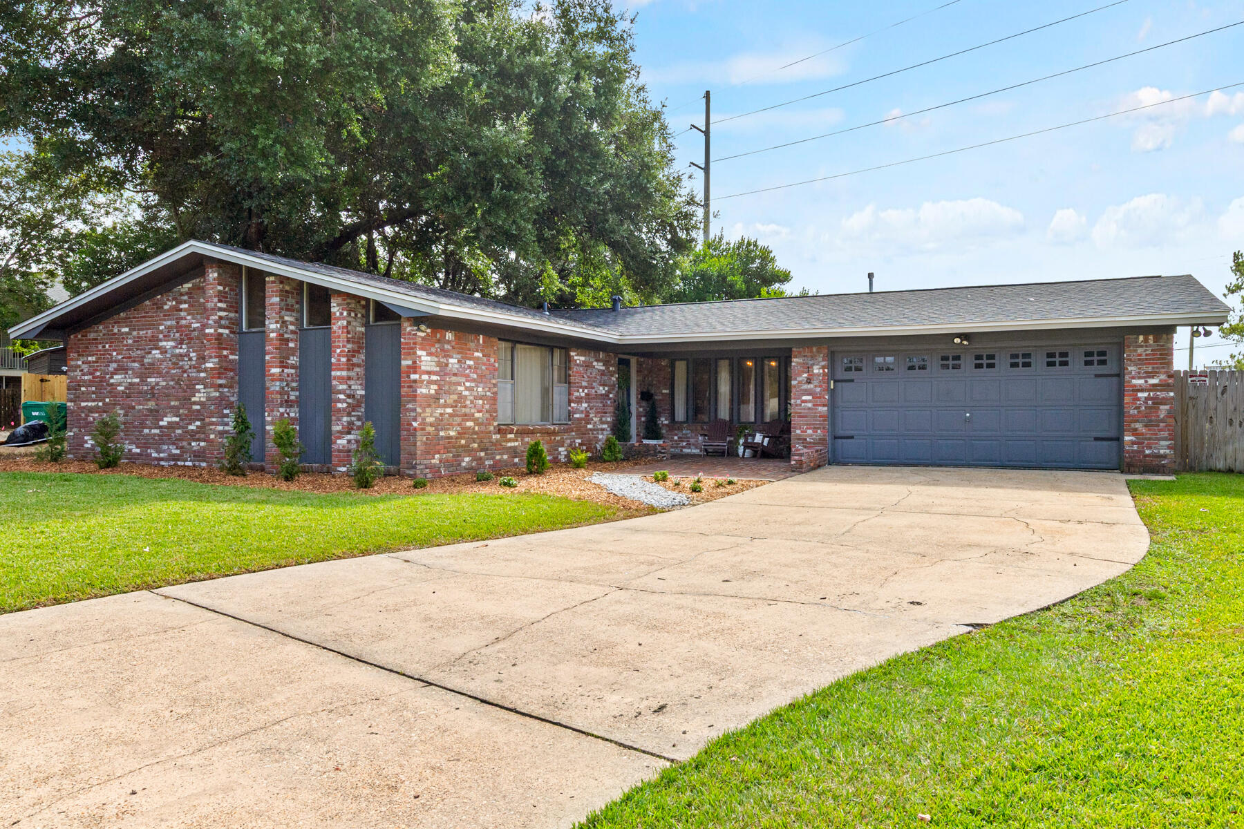 Don't miss this wonderful home located in the Northgate subdivision of Fort Walton Beach! Situated on an oversized lot with incredible potential in the backyard, you will fall in love with the peace and tranquility. You can enjoy the beautifully updated kitchen and living room, and then unwind in the three bedrooms, with the potential for a fourth bedroom in the front office/ flex space. Living in Northgate, you can enjoy several miles of walking and biking, and endless entertaining opportunities during holidays year round. Rest easy knowing that a NEW roof was installed in 2021, new gas water heater in 2022, and new HVAC in 2015, and all electrical was updated in 2015. Reach out to schedule your private showing today!