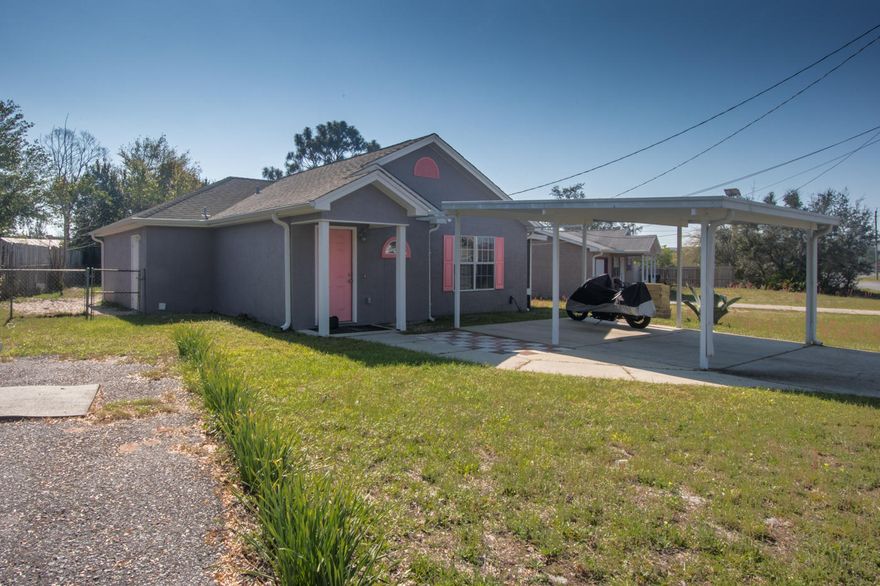 This 2 bedroom 2 bath home is move in ready. Extra Parking for a motor home or boat. No HOA, High ceilings, Tray ceiling in master bedroom. Screened porch off the dining room.Just North of Hwy 98 but, a short stroll to the beach. Open floor plan with raised ceilings. Located very close to Walton county, Hwy 79 and or Pier Park.