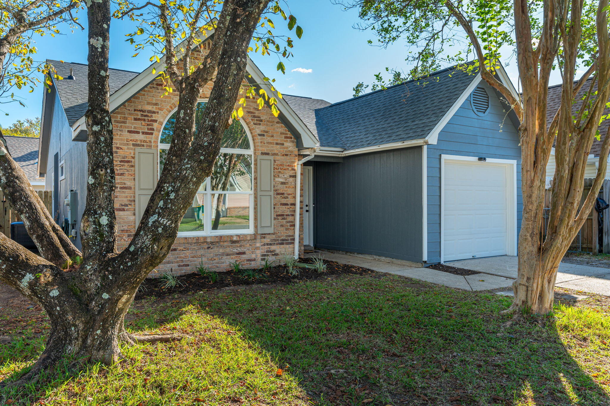 Discover modern comfort and style in this beautifully renovated single-family home, ideally located in Fort Walton Beach. Thoughtfully updated from top to bottom, this move-in ready property features brand-new flooring throughout, stunning quartz countertops, and new appliances that blend function with design. Enjoy fresh interior paint, updated fixtures, and upgraded bathroom vanities that bring a polished, contemporary look to each space. The primary suite offers a luxurious stone tile shower, providing a spa-like retreat at home. Additional upgrades include epoxy-coated garage floors for durability and a clean finish, as well as a new roof, HVAC system, and water heater--all replaced in 2023, offering peace of mind and long-term value. Whether you're relaxing at home or entertaining guests, this property offers modern amenities in a convenient location close to shopping, dining, and the beautiful Gulf Coast beaches. Schedule your private showing today and experience everything this renovated gem has to offer.
