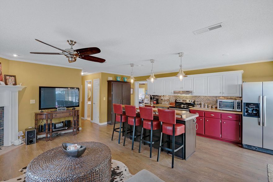 BRAND NEW ROOF!!!!BEST PRICED HOME ON THE WEST END OF PCB!!Beach Home, correctly named ''Chillin The Most'' Built for Entertaining! Located in Riviera Beach on the Desirable West End of PCB! Block Construction! Large, Aprox.1540 sq. ft. Home with 3 Bedrooms and 2 Full Baths. Walk or Golf Cart Ride to Beach! Brand New 3 1/2 ton 14 SEER AC Unit, Wood Burning Fireplace, Jetted Tub in 2nd Bath. Large Island with Stainless Steel Countertop and a Breakfast Bar! Stainless Steel Appliances, Large Master Suite with Walk In Closet, Newer Water Heater, New Carpet in Guest Bedrooms, Split Floor Plan, Outdoor Shower, Paver Patio, Privacy Fenced Yard, Nice Size Storage Shed. Transferable Termite Bond. Listing Agent has Ownership in Property. If sizes and details are important to you, please verify.