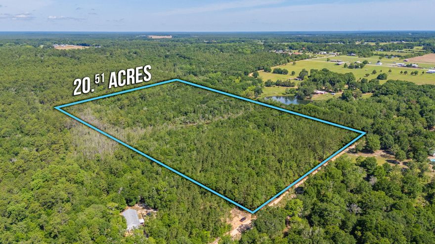 Large wooded parcel, approximately 20 acres. A hunter's paradise, very secluded, ideal for building a secluded retreat or dream home, offering ample privacy. A large path has been cut to the pond and there's a nice creek flowing through the property, but buyer must verify. Additional acreage is available, totaling approximately 69 acres. Please inquire for pricing. Survey available for this parcel.