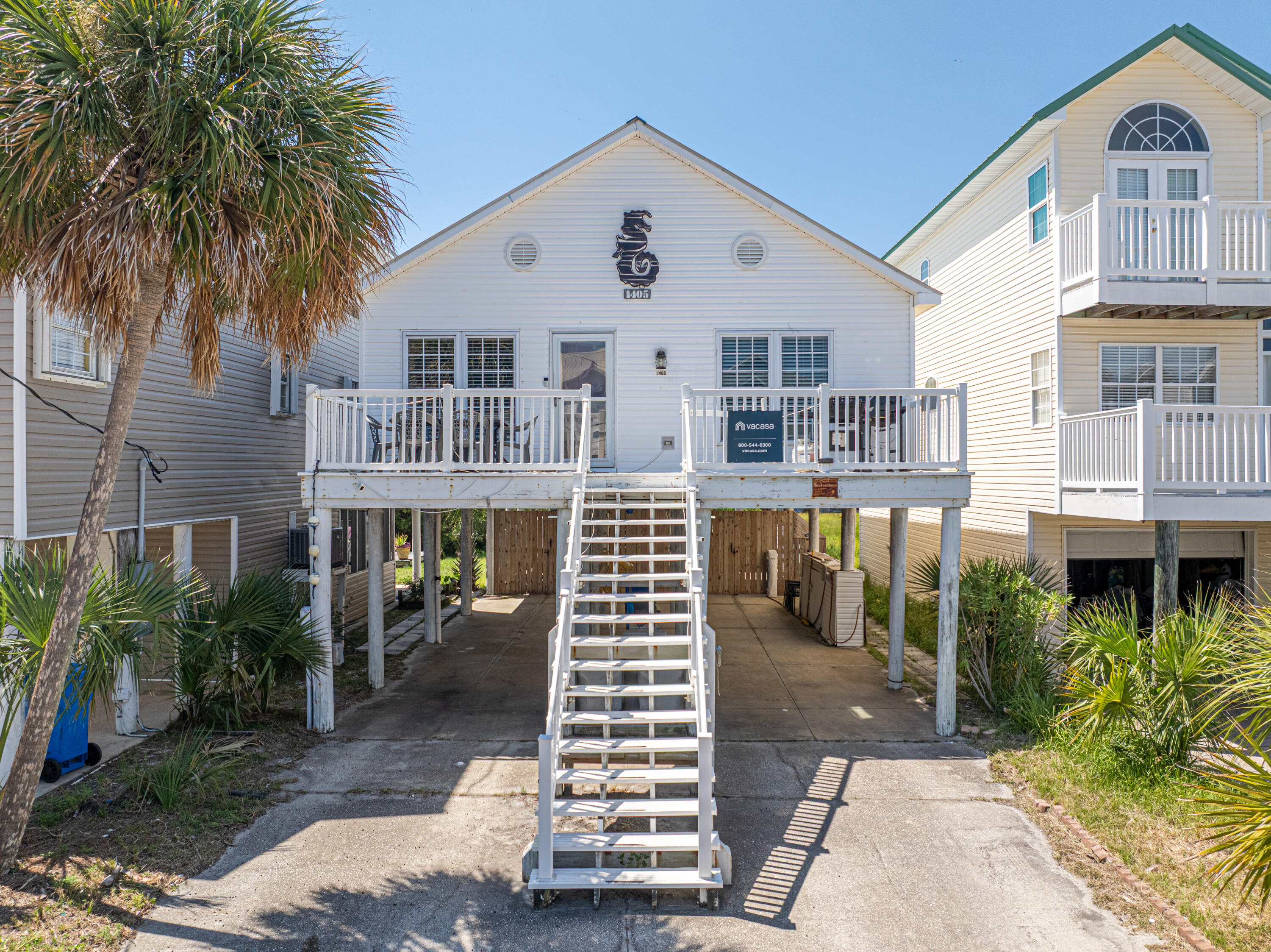 This thoughtfully maintained beach cottage offers an ideal blend of comfort, style, and location -- just steps from public beach access, waterfront dining, and a variety of local water sport activities. Inside, the home features updated furnishings and tasteful coastal decor throughout, with durable luxury vinyl plank flooring and a bright, open-concept layout connecting the kitchen and living areas. Sold fully furnished, it's ready to enjoy from day one. Outdoors, both the front and back porches are perfectly positioned to capture views of the Intracoastal Waterway and Gulf, offering peaceful spots to unwind. Beneath the elevated structure, you'll find generous open space ideal for additional parking or transforming into a shaded entertainment area. An outdoor shower adds a practical... touch after a day in the sun and sand. Whether you're looking for a relaxing second home or a strong investment opportunity, this property offers a rare chance to own in one of the most peaceful, unspoiled stretches of the Emerald Coast.