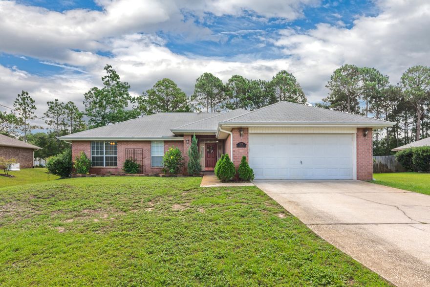 You will fall for this completely updated 4 bedroom, 2 bathroom home! Walking in, you're greeted with tile throughout the living area, an updated kitchen with beautiful cabinets, granite countertops, and all stainless steel appliances. A large, open living area can house even the largest of sectionals, and is open to the dining area and breakfast bar for great entertaining. The master bedroom features brand new carpet, and the master bath is large, with a double vanity and walk-in closet. Outside is an entertainer's dream! A beautiful finished deck and pergola for the best parties. Schedule your appointment today, you don't want to miss this one!