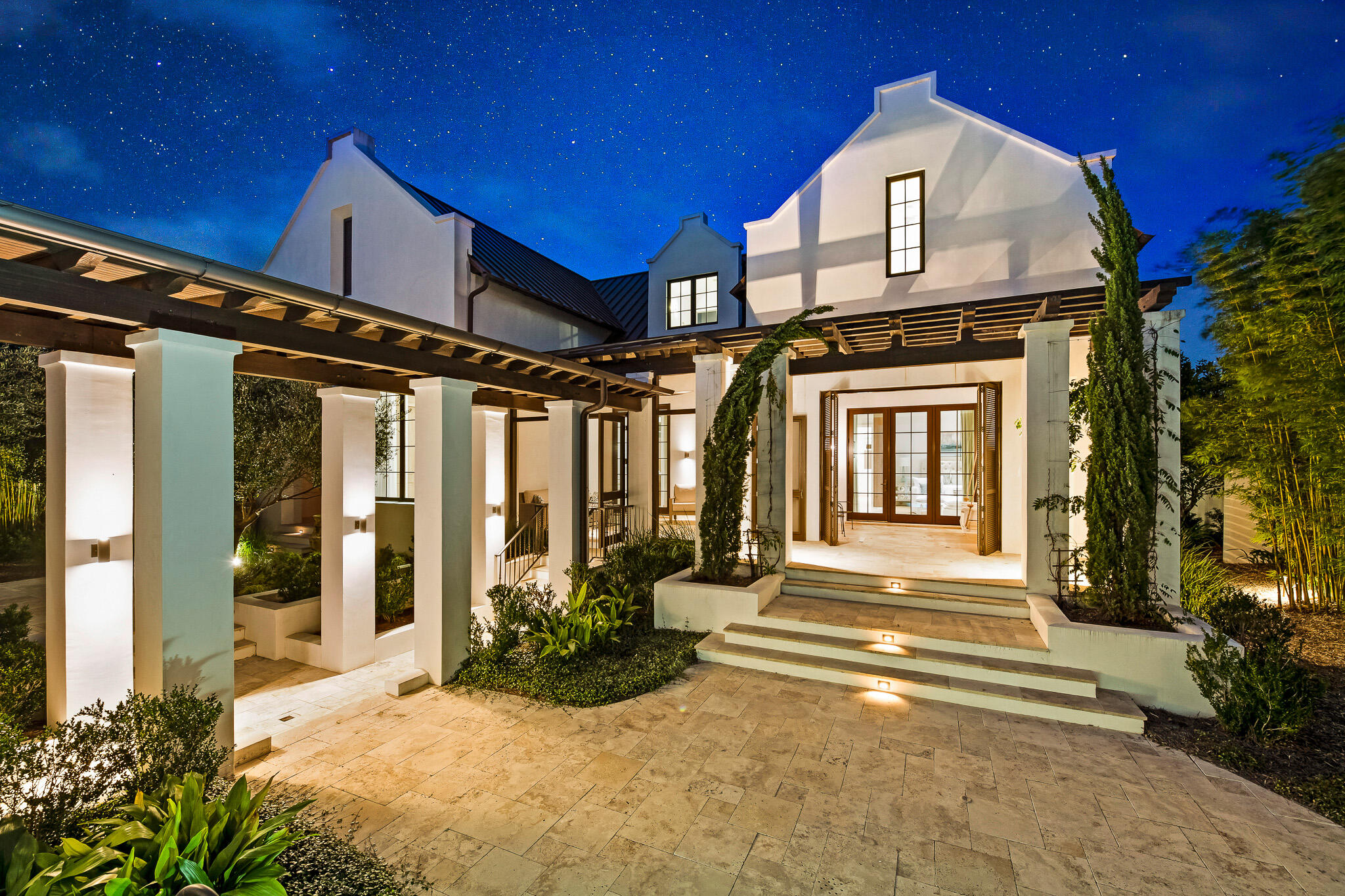 Welcome to 288 Walton Rose Lane; an architectural masterpiece designed by A Boheme Design and built by Galvas Construction and located on the East end of 30A. Just steps away from Rosemary Beach, this home is built with intention and elegance. Completed in 2018, this truly unique home offers privacy in a secluded compound in the heart of Inlet Beach and is located mere steps to Rosemary Beach. 288 Walton Rose Lane features five bedrooms, six bathrooms, and 4,467 SF. Walking in, this gorgeous property greets you with an impeccably lush landscape; featuring mature citrus trees, olive trees, privacy bamboo and outdoor lighting which further enhance the splendid outdoor space.Buyer to verify all information and dimensions. Information is deemed reliable but not guaranteed.