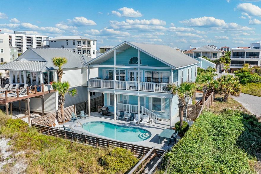 Seaspray: Gulf-Front Investment Opportunity Welcome to Seaspray, a spacious nine-bedroom beachfront estate located on over half an acre in beautiful Miramar Beach. This property is ideal for large family reunions or as a lucrative investment opportunity, with an impressive rental income potential of $300K annually. With a private pool and breathtaking Gulf views, Seaspray captures the essence of coastal living.Main House: The six-bedroom, five-and-a-half-bathroom main residence offers a relaxed, functional layout for entertaining and vacationing: The first floor includes four bedroom suites, each with private bathrooms. These rooms range in style and feature two King Master Suites with views of the pool and Gulf, along with another King Suite and a children's bunk room with queen bunks and a queen trundle.

Upstairs, the open living area provides expansive Gulf views through large windows. This space includes a vaulted ceiling, comfortable seating, a dining area for eight, and a practical kitchen with two refrigerators and two dishwashersperfect for preparing meals for a crowd. Additional sleeping spaces on this floor include another King Master Suite and a guest room with queen bunks.

Guest Cottage: The charming guest house includes three bedrooms and two bathrooms:

On the first floor, you'll find a King Master Suite with access to a full hall bathroom and an open living area connected to the kitchen and dining space.

Upstairs, two Queen Guest Bedrooms share a full bathroom, offering privacy and comfort for additional guests.

Upgrades & Features: The property includes several recent updates for added convenience:

Trex decking and a pool deck remodel (2021)

New roofs (Main House: 2016, Cottage: 2023)

Tile flooring in the Cottage (2022)

Updated kitchens (2020), including built-in media-ready queen bunks installed in 2019

Additional Highlights:

Located on a private drive (Sandy Beach Road), with verified legal documentation ensuring privacy and towing for unauthorized parking.

Ownership extends to the mean high water mark, with supporting documentation available, offering significant Gulf-front property rights.

Seasonal beach service with three complimentary setups provides easy access to the stunning shoreline.

Endless Potential: Seaspray offers an exceptional opportunity as both a vacation retreat and an income-generating property. Its prime location, ample space, and desirable features make it an investment worth considering for those seeking to enjoy or profit from the Gulf Coast lifestyle.

