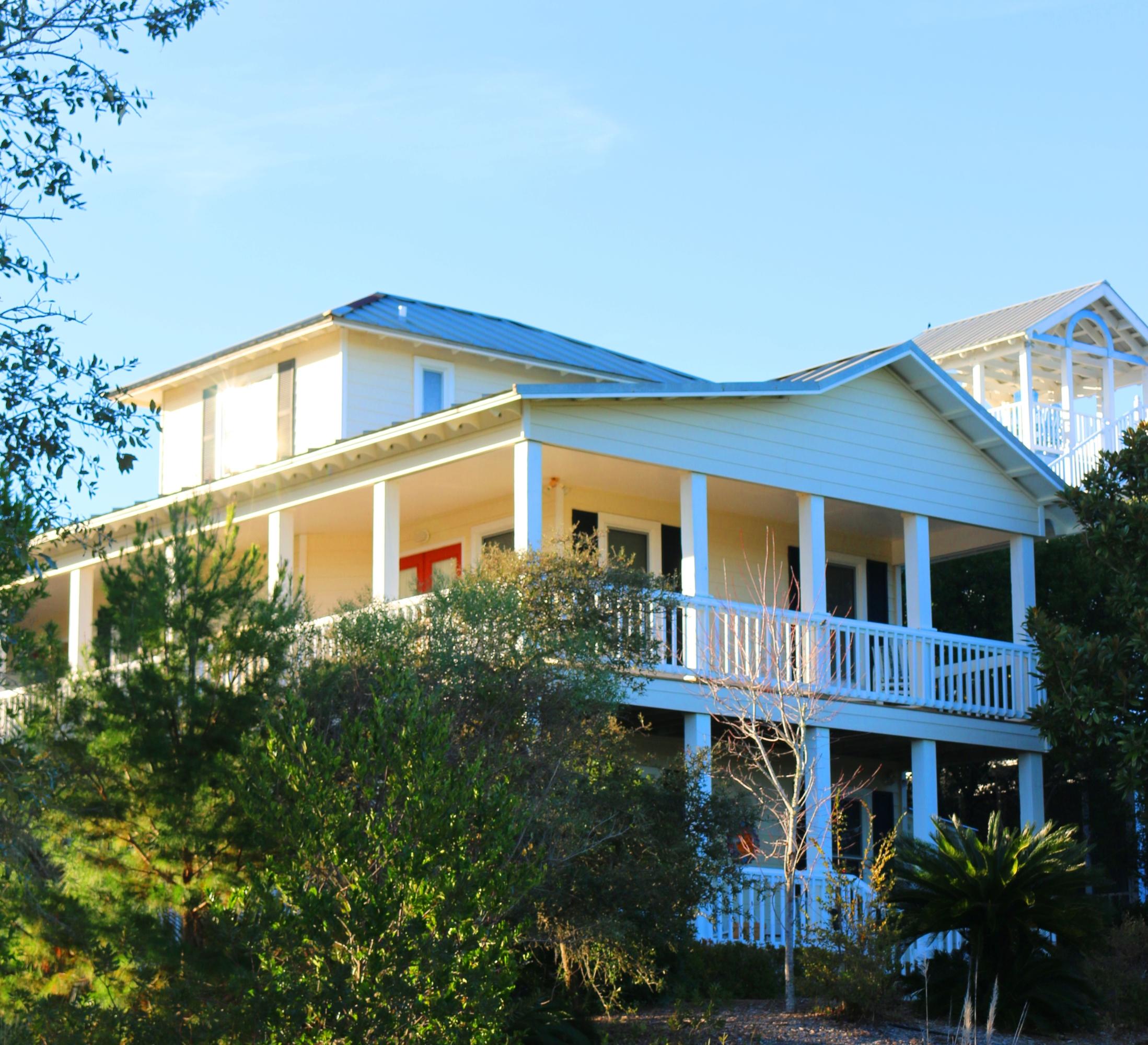 Charming beach house in sought after community of Calypso Pointe on the west end of Scenic 30A. Dune Allen is one of the quietest and most popular areas on 30A. Just a few minutes drive from Sandestin, the Silver Sands Outlet, Sacred Heart Hospital and Grand Blvd. fine dining and shopping and a few minutes walk to the shops and restaurants of Gulf Place. Santa Rosa Golf Club is across the road and the dedicated beach access is just steps away. Great gulf views from second and third levels. The house is across from the community pool and the gated neighborhood offers privacy and serenity in a natural setting.
