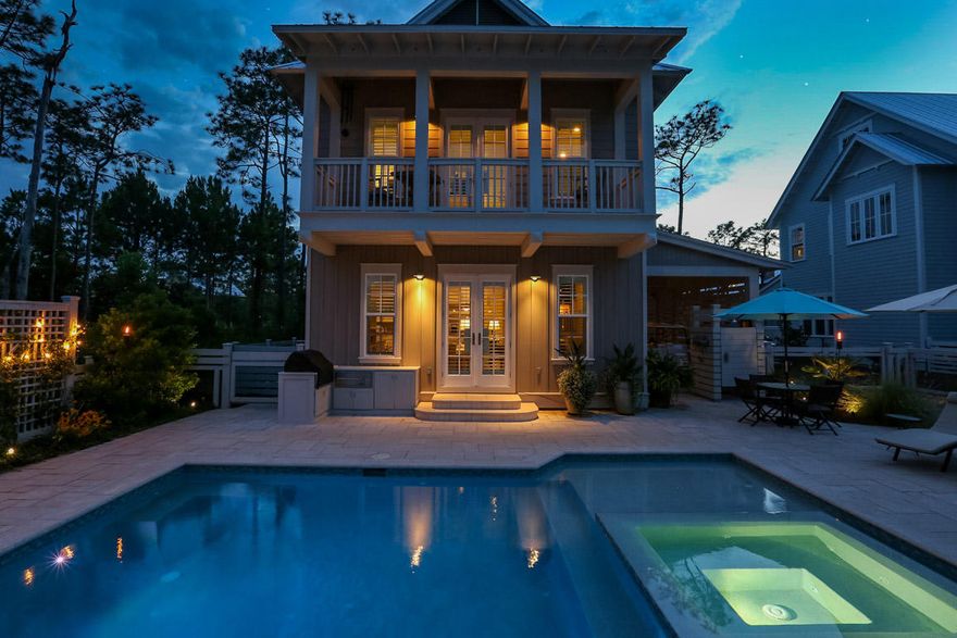 This magnificent residence in the coveted Cedar Woods district of Watercolor boasts 4 bedrooms, 4.5 baths with exquisite interior and exterior details that can only come from timeless architectural design and meticulous construction. This stunning home has only been enjoyed by family and guests and has never been on the rental program. The out-door living space and courtyard are one of a kind, featuring a heated pool , spa, outdoor kitchen, custom designed surfboard shower, covered lanai with rustic fire pit, large flat screen TV, and ample space for relaxing or gathering the family. In addition, this home features a spacious garage with separate 2 vehicle car port and an irrigation system to maintain the stunning landscaping. A staple in the Coastal South is an abundance of welcoming