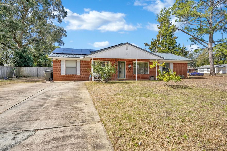 BACK ON MARKET!! Newly updated Guest Bath!! Spacious 4 Bedroom, 2 1/2 bath all brick remodeled home on a large corner lot with an in-ground pool in a great neighborhood. Pool was done in 2019. Solar was done in 2020. Interior features include: kitchen renovations in 2015-countertops and cabinetry, tile flooring and backsplash, appliances and kitchen island. This home has a nice open split floor plan. HVAC with duct work installed in 2014. Water heater in 2019. Metal Roof in 2020. Large laundry room with windows off the gathering room. Side yard has a place for an RV with waste and electric hook up. Back yard has covered patio with a nice dining and seating area to enjoy poolside fun. Entire lot has irrigation system. Work-shed has workbench and electricity and the lawn pump is inside, out of the elements. Backyard has privacy fence all around.