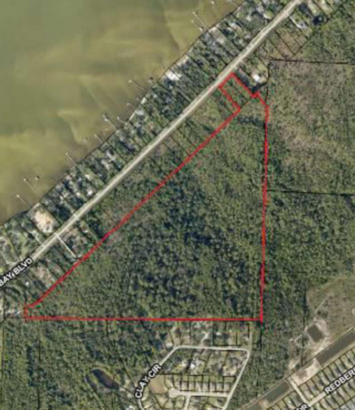 Rare 75.62+/- acre Opportunity in Gulf Breeze!Combining three parcels into one extraordinary offering just off Hwy 98. Rolling, partially wooded terrain with convenient road frontage--make it your private estate ground, mini‑development site, or preserved sanctuary. Electric runs nearby; buyer to verify utilities. A rare opportunity for land this large in one of Santa Rosa County's most desirable coastal communities.
