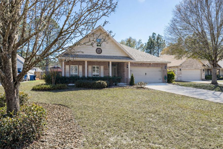 Experience waterfront living with The Bonaventure floor plan by Holiday Builders, perfectly positioned in the Symphony neighborhood of Hammock Bay. This move-in ready, 3-bedroom, 2-bath home offers 1,881 square feet of open, comfortable living along a picturesque street framed by mature landscaping and water views that immediately set the tone for something special.Step through the front door and the ceilings rise to approx. 14 feet, creating a sense of space that feels open and inviting from the very first glance. Wood floors extend through the main living areas and into the generously sized primary bedroom, while a gas fireplace anchors the living room with warmth and character. The large eat-in kitchen, complete with a gas range, offers room to gather, cook, and connect, all flowing naturally into the dining and living spaces for effortless everyday living and entertaining. A split-bedroom layout provides privacy and functionality, making the home comfortable and well-designed for a variety of needs.

Out back, the covered patio becomes your front-row seat to the pond. The fully fenced, oversized yard offers space to relax, host gatherings, or simply enjoy peaceful Florida evenings as the water reflects the changing sky. A storage barn adds convenience, keeping everything organized without sacrificing space.

Just beyond your doorstep, life in Hammock Bay feels like a private retreat. Spanning more than 3,000 acres of preserved natural surroundings, this thoughtfully designed community includes over 12 miles of sidewalks, nature trails, and bike paths that connect neighbors to everything it offers. Residents enjoy multiple resort-style pools including a 25-meter lap pool, a 4,000 square foot fitness center with 24-hour access, lighted basketball, tennis, and pickleball courts, putting greens, picnic areas, outdoor cooking spaces, and a general store that adds charm and convenience. Canine Commons provides a dedicated pet park with washing stations and water bubblers, and the nearby 60-acre sports park expands recreational opportunities even further.

At Town Square, an open lawn-style amphitheater hosts concerts, movies, and community events, while local dining, rotating food trucks, and gathering spaces create an active social setting that brings neighbors together. For those who love the water, Steamboat Landing offers 480 feet of shoreline along Choctawhatchee Bay, a 500-foot dock, fishing pier, bayfront clubhouse, and covered pavilion with sunset views that make every evening feel special.

Located in Freeport, one of Northwest Florida's growing bayfront communities, Hammock Bay provides convenient access to the beaches of South Walton and Florida State Road 30A, as well as Destin, Niceville, major airports, Eglin Air Force Base, and Hurlburt Field.

This is more than a home. It is a setting where spacious design meets resort-style amenities, where lake views greet you each morning, and where every day carries the feeling of a well-earned retreat. Come experience firsthand how comfort, community, and waterfront living come together in Symphony at Hammock Bay.