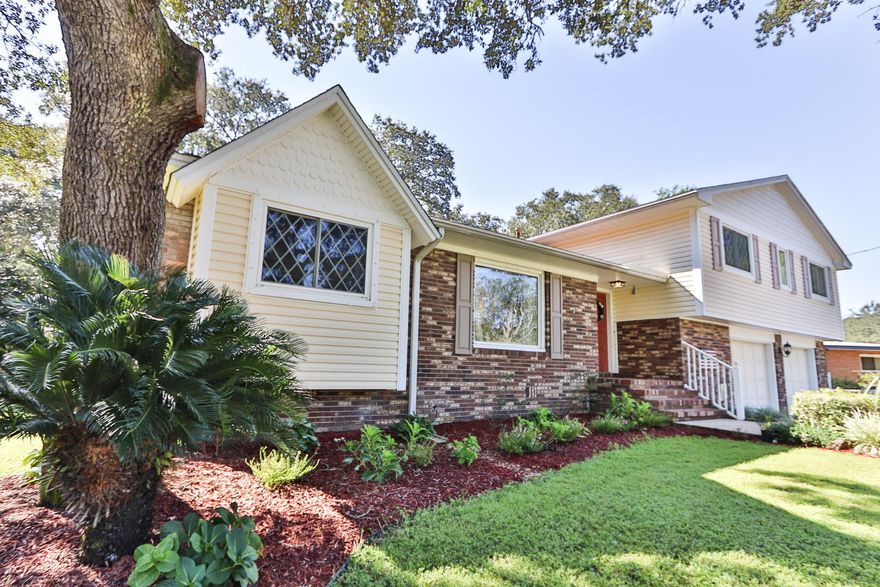 Beautiful home on scenic Yacht Club Drive. If you are looking for a home with a large yard and room to grow this home has been lovingly cared for and features 4 large bedrooms and 2 baths. All the bedrooms are upstairs. The first floor is the living area with a formal living/dining room combination, nice eat-in kitchen, freshly painted and updated with stainless steel appliances. A large den with custom built-in cabinetry and a fireplace. Down stairs is a bonus room which is currently being used as a home gym. The yard is large with mature trees that give you lots of shade to relax on the deck or swing. This home also features a NEWER HVAC system, tankless hot water heater and NEWER COPPER WIRING! New exterior and interior light fixtures/fans, Freshly landscaped,New well & lawn pump.