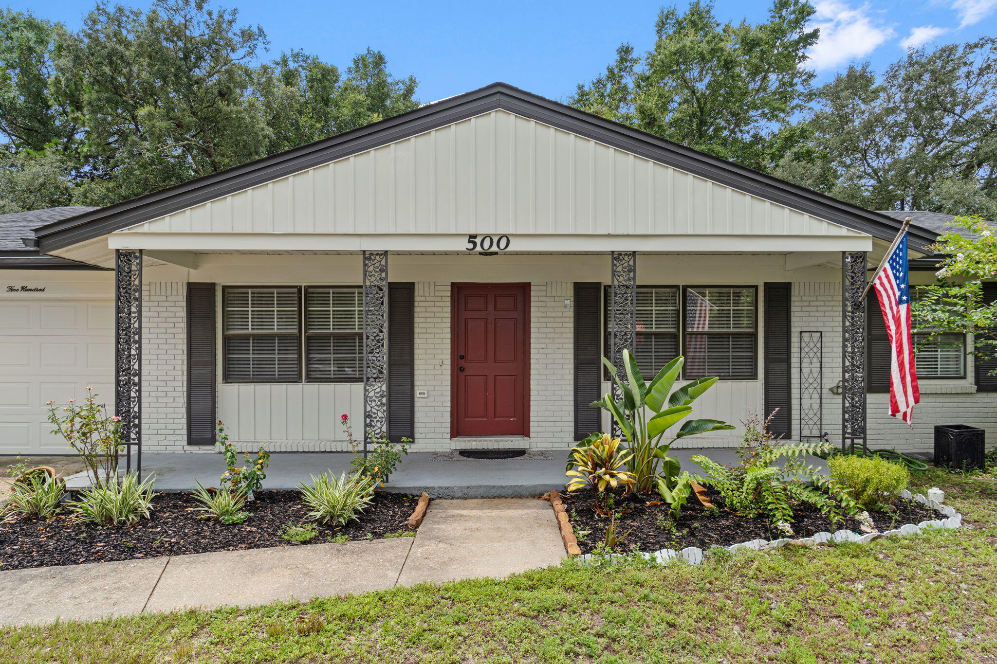 Welcome to 500 22nd St in the heart of Niceville--this beautifully remodeled 4-bedroom, 2-bathroom home offers 1,877 sq ft of thoughtfully designed living space and updates throughout. Fully renovated in 2023, you'll appreciate the modern finishes paired with timeless charm.Step into an open-concept layout featuring crown molding, luxury vinyl plank flooring, and a bright, airy kitchen complete with quartz countertops, a bespoke refrigerator, gas cooktop, double ovens, and a spacious breakfast bar perfect for everyday dining or entertaining. A dedicated coffee bar offers added convenience.The living room features a stone fireplace and seamless flow into the kitchen and dining areas. The private primary suite includes a large walk-in closet and a spa-inspired en suite with dual functionality.
Enjoy peace of mind with a 2023 roof, HVAC, and water heater, and relax outdoors in the fully fenced backyard, complete with a fire pit, swing, and mature trees, perfect for gatherings or quiet evenings.
Additional highlights include custom built-ins, indoor laundry, and plenty of storage throughout.