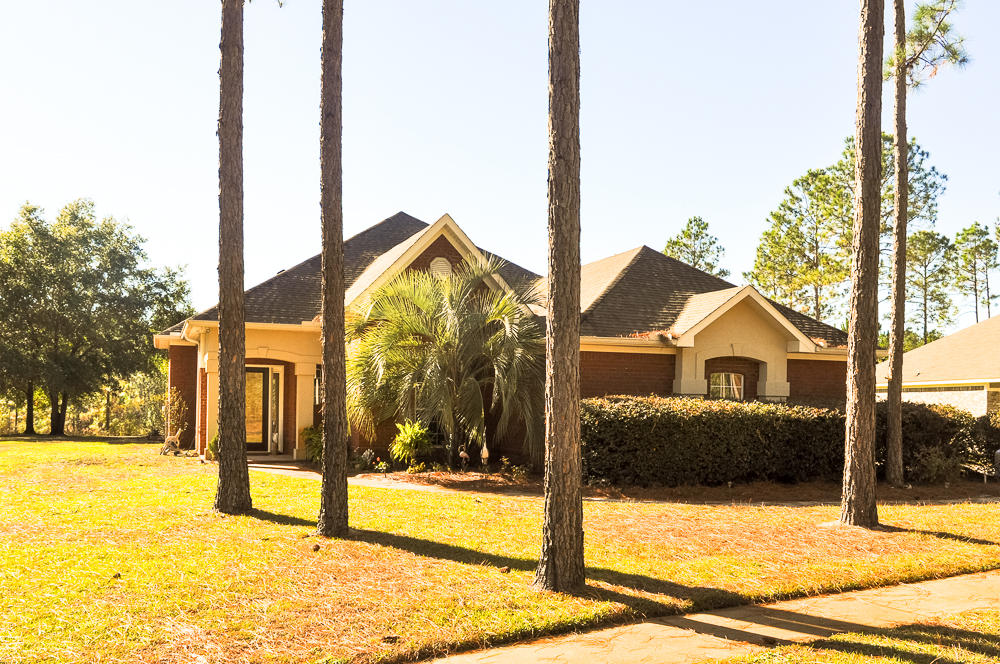 Well maintained custom all Brick Home in the gated golf community at Windswept Estates. This well laid out three bedroom 2 bath home offers a ton of space at a reasonable price. Wood floors, gas cook top, wall convection oven and microwave appoint this open kitchen central to the living space. The formal dining room has built-in wine refrigerator and ice machine for convenient entertaining. The screen enclosed salt water pool and spa is a great space to enjoy in this year round beautiful weather. The all brick storage building offers extra storage. There are so many amenities this is a must see to put on your list today.