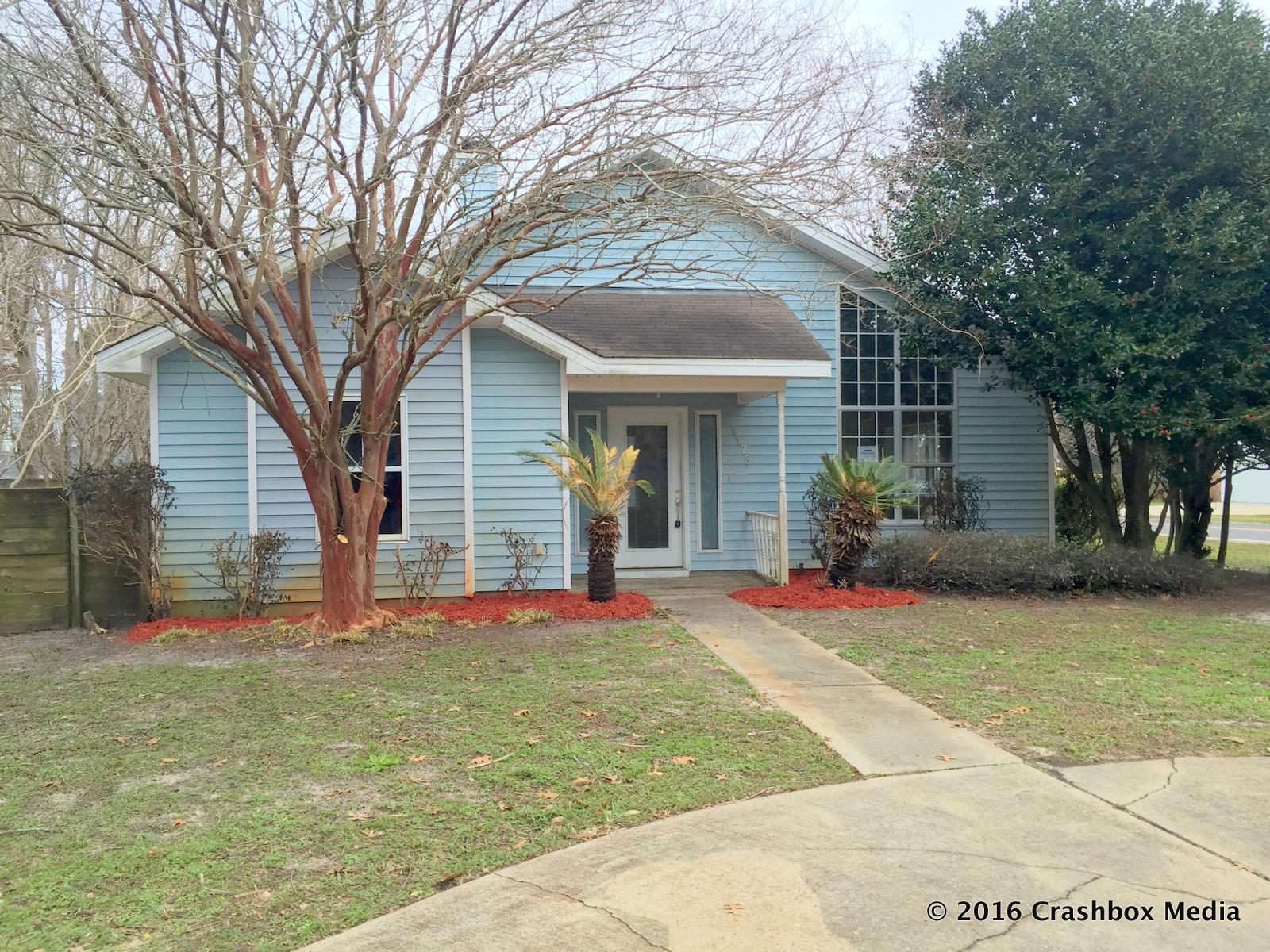 REO Home - Affordable home in the heart of Destin is now available. The home sits on a large, corner lot minutes to the bay, Destin harbor, the elementary school, and Joe's Bayou Boat Launch. This location puts you close to shopping, entertainment, and water sports and gives you access to the Destin Bridge and Mid-Bay bridge without having to get on congested Highway 98. This home boasts an open floor plan with split bedrooms. The great room has vaulted ceilings, a fireplace, and an office space. The gorgeous kitchen features slate countertops, oak cabinets, and built-in shelving. The master bedroom has an en-suite bathroom with jacuzzi tub. Additional features include an enclosed garage, circular driveway, and large deck. Great price, great location! Call your agent today.
