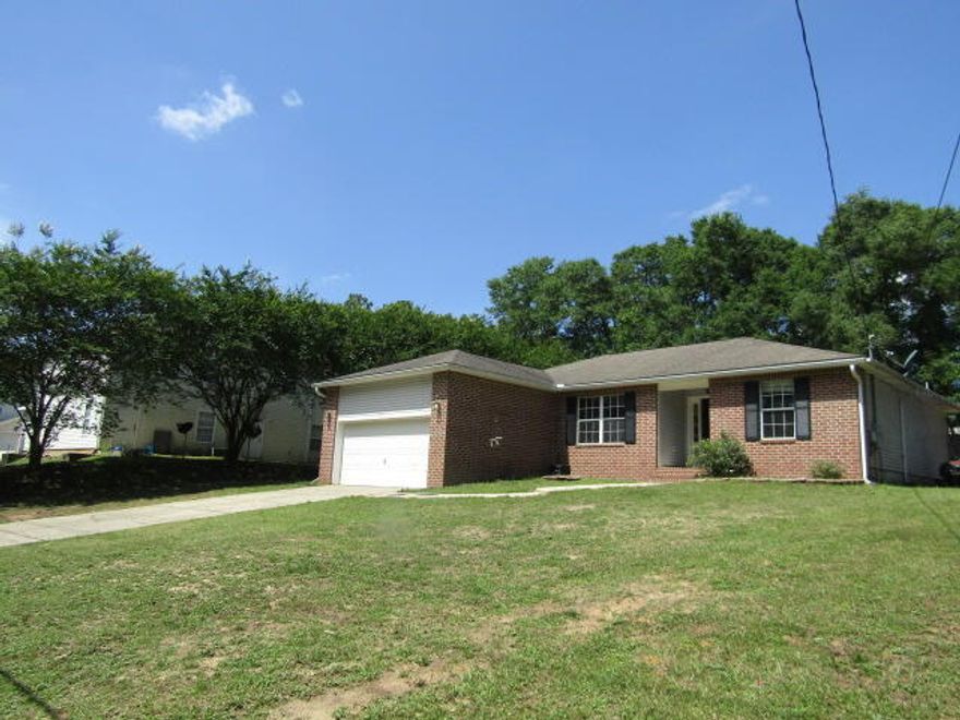 Nice 4 bedroom, 2 bath home located in the center of Crestview, FL. This home is convenient to the military bases, shopping and just a short drive to the Emerald Coast's beautiful beaches. For family time and entertaining guests, you will enjoy your 20' x 16' family room with raised ceilings, crown molding, and laminate (wood look) flooring. The kitchen has stainless steel appliances, solid surface countertops, plenty of cabinets and tile flooring for easy cleaning. The master bath has tile flooring, double vanity sinks and a beautiful Travertine surround in the master shower. Privacy fenced backyard for the kids to play and enjoy and the owner has built a brick grill for outdoor cooking. Seller is offering  $5,000 towards buyer's closing costs with an acceptable offer.