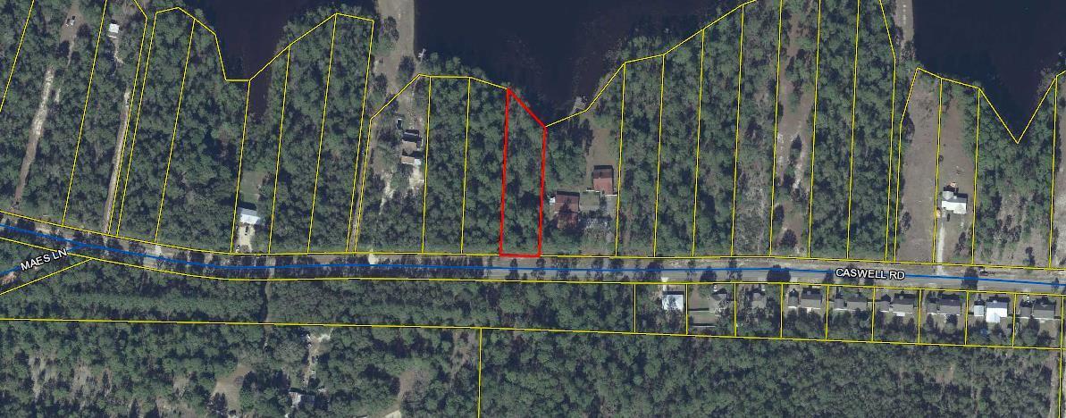 Lakefront property located on Lake 2 of Imperial Lakes. Lot is in the group that are restricted from mobile homes allowing for new construction homes only with a minimum of 850 sq ft. Lot is on a paved road and just outside the City Limits of DeFuniak Springs. Public water is available.