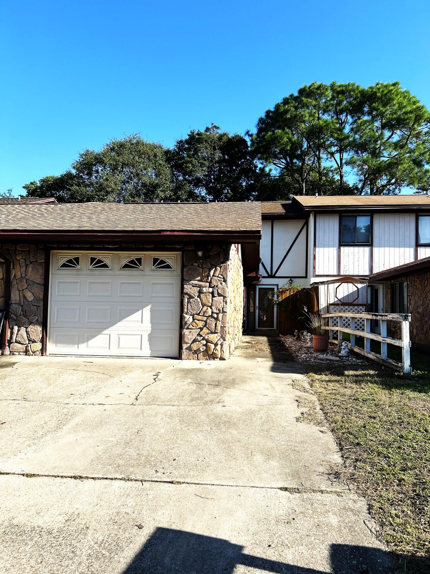 Sweat equity, new paint and carpet for the upstairs will get you a great home.  Exterior also needs to have trim painted. This townhome is tucked away and ready to have some love put back into it. This is being sold as-is but everything works great. Owner had physical disabilities and could not give it the love it needed. Large master bedroom with 2 walk in closets. Large living area in the back of the house with good size kitchen as well. Half bath down so no climbing the stair every time. Hardwood floors through out the down stairs. Cute open patio area in the back. Don't forget it even has a one car garage. Great bones and this is just waiting for a new family to call this home.