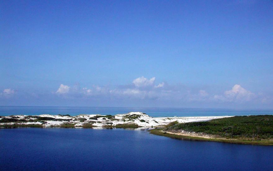 Location! Location! Location! This lot sits on the south side of 30A on Camp Creek Lake. NO HOA dues and private beach for owners make this this homesite a rare find. The communities of Rosemary Beach, Alys Beach and WaterSound Beach are just minutes away.