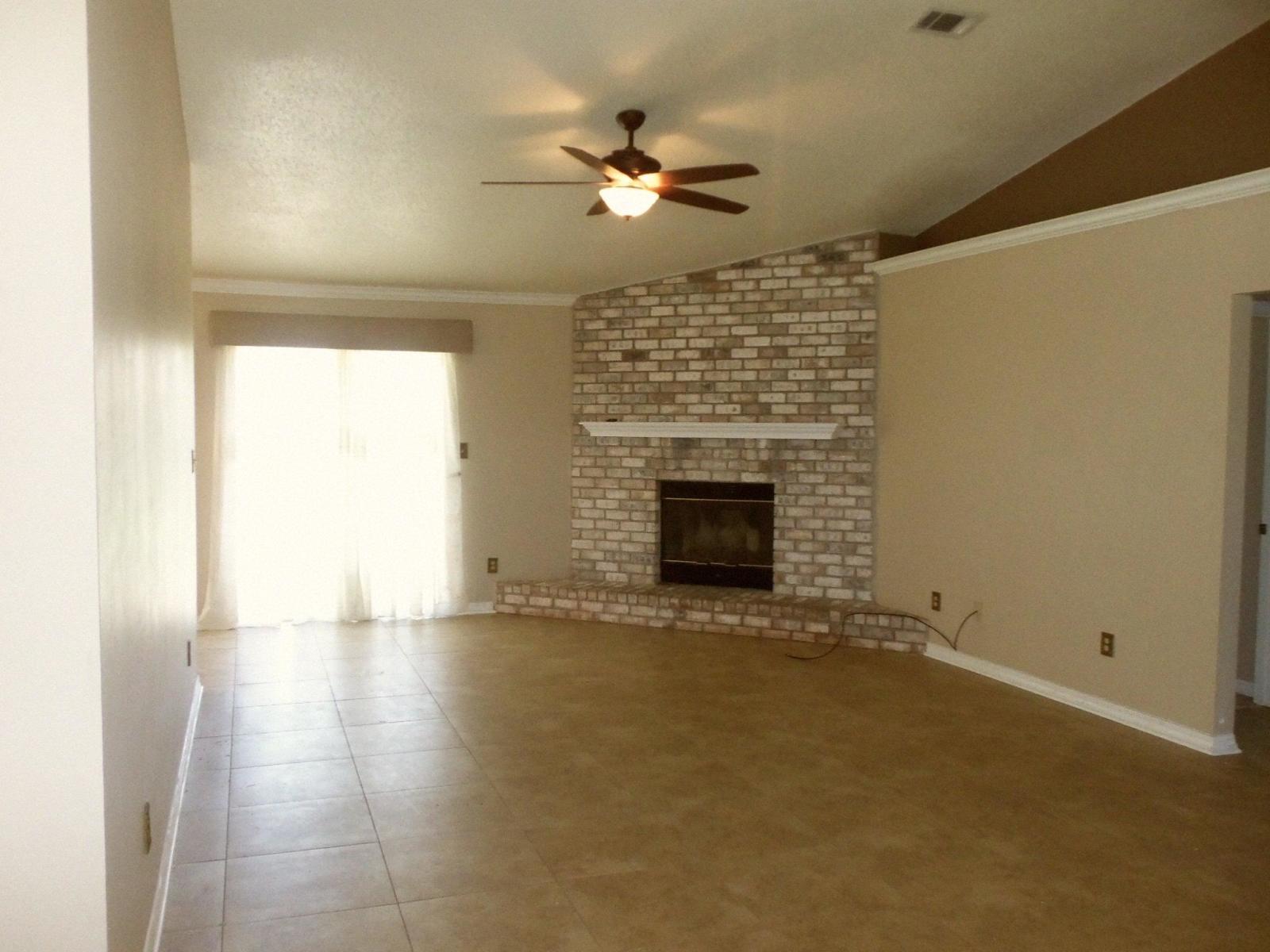 Nice split bedroom plan with all walls painted with warm colors. Lovely corner brick faced wood burning fireplace; ceramic tile floors throughout with carpet in the bedrooms; vaulted ceilings in living room, dining room, kitchen and breakfast area. Master bath has a garden tub, double vanity and two walk-in closets!!! Owner will allow up to two pets not larger than 50lbs. Available July, 15th