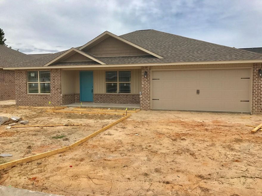 Beautiful All Brick Home being BUILT! Nice Modern cabinets, lighting fixtures, and plumbing fixtures. Granite counter tops in the kitchen and bathrooms. Tile floors in Kitchen, Master bath, and hall bath. Ceiling fans in the Master Suite and Living room. Master Suite with a trey ceiling. The Master bathroom has double vanity, garden tub and a large walk-in closet. Energy Efficient home with quality double-paned low E windows. Insulated exterior doors, ceiling and exterior walls, and inside laundry room. 14 SEER Heat Pump. Sodded front and side yards, and 10' on backyard.