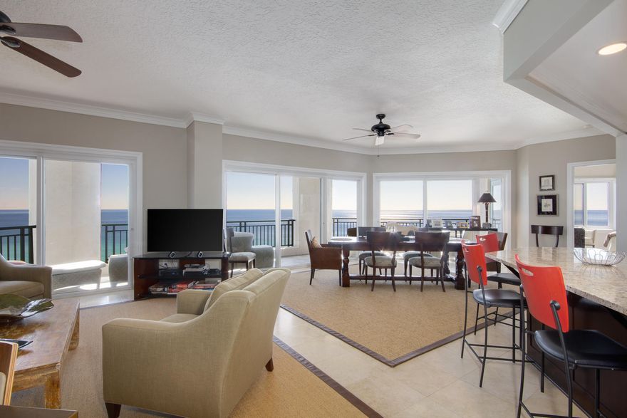 Incredible, 14th floor east corner beachfront resort condo. The interior is beautifully remodeled in a modern contemporary style and offers private balconies off of 3 bedrooms and beach views from almost every room. Enjoy a large living/dining combo with raised ceilings, crown molding, wall to wall sliders leading to the 31' balcony. The kitchen is a focal point with granite counters, rich mahogany cabinets, and state of the art appliances including a see-through fridge, smooth top stove & range, and 2-drawer dishwasher. Finding a 4 bedroom like this is a rare gem. Southwinds III is a gated, community that is rental restricted offering Tesla charging station & golf cart parking. Enjoy the private, deeded beach access, covered garage parking, and private pool just for owners & their guests