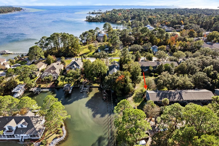 This townhome was built for the boater who needs to be on the water, specifically on protected water in Niceville proper, tucked away in the Sarah Ann Bayou.  Wake up to beautiful sunrises, park your boat at the almost brand-new dock, watch the storms roll in and out, and take advantage of the cozy quietness at the end of 17th Street. Enjoy the ease of being close to local marinas, restaurants, shopping, and schools. 
Unit 24 at Rocky Bayou Townhomes has been renovated with clean, modern touches.  My favorite update is the Elfa Closet system in the Main Bedroom.  This unit is turn-key ready!

Buyer must verify all measurements and all pertinent information in the listing.