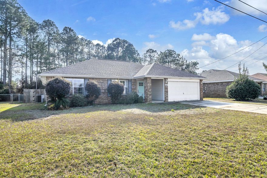 The search is over! Now finalize your next home. Offered at a competitive price, this three-bedroom, two-bathroom home is listed below its appraised value and is conveniently located just five minutes from Navarre Beach. The residence features a generous kitchen area suitable for a dining nook, a distinct living space with a pass-through window to connect family, a laundry room accessible from both the kitchen and master bedroom, and an expansive backyard that can accommodate a swimming pool and still have adequate space for the kids to run and play. Roof 2020, HVAC 2017 Hot water Heater 2019. Super accessible to wonderful schools, shopping and Hurlburt AFB.