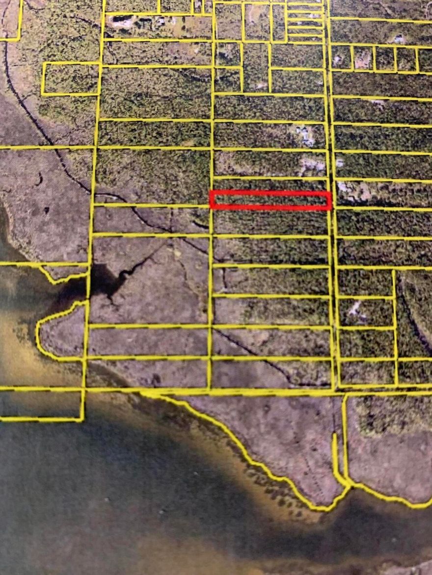 Just Reduced!!!  Motivated!  Beautiful views from this 5 acre vacant parcel located on North Church Street. This wooded parcel has nice trees and plenty of room for your enjoyment.  The back of the property would afford you a perfect view of the Bayou and the natural marsh.  If you are looking for a larger tract with a great price this is the one.