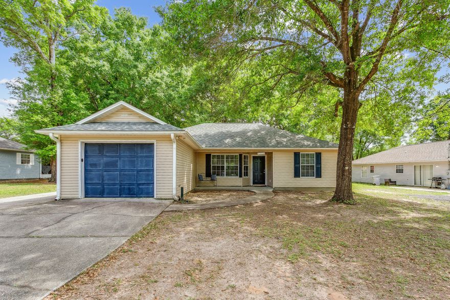 Well maintained home with close proximity to it all.  The property boasts a large yard with chainlink fence enclosing smaller play area for the kids. The open floor plan allows for easy flow throughout the home.  Living room/dining extends to a Florida Room that is perfect for entertaining.  The garage has been converted to a hobby room but can easily be converted back to its original purpose.  You won't find any carpet in this home which allows for easy maintenance.  New roof was installed in 2022.  Want to install a pool or workshop? You have plenty of room.  Don't miss out on this home.  Schedule your showing today.  Survey available