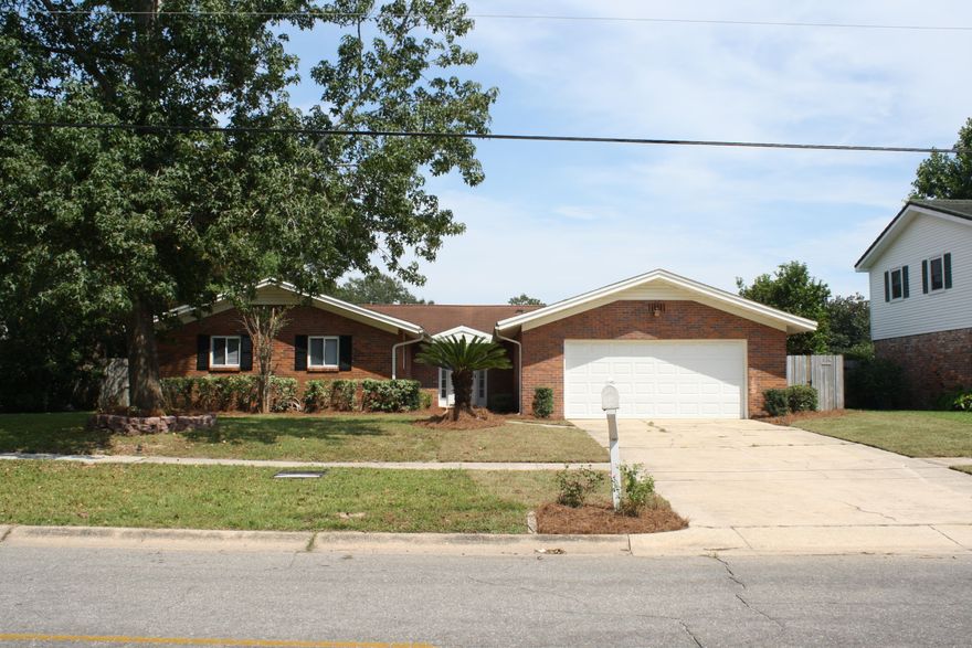 MUST SEE!!! Spectacular completely renovated, move in ready home in the prestigious Kenwood golf course neighborhood. The floor plan is arranged for privacy without compromising the open feeling many homeowners desire. Complete remodeling features hardwood, tile and new carpet flooring, baseboards, stainless appliances, plumbing fixtures, lighting, new cabinets, granite countertops in kitchen and baths, whole house Generac generator, scraped and textured ceilings and walls in neutral paint colors, large walk in master closet with granite vanity area, and custom master shower. HVAC unit is approximately 2 years old. Home has all new copper wiring. The yard has been re-sodded and landscape with plants that provide a true Florida feel to this exquisite home.