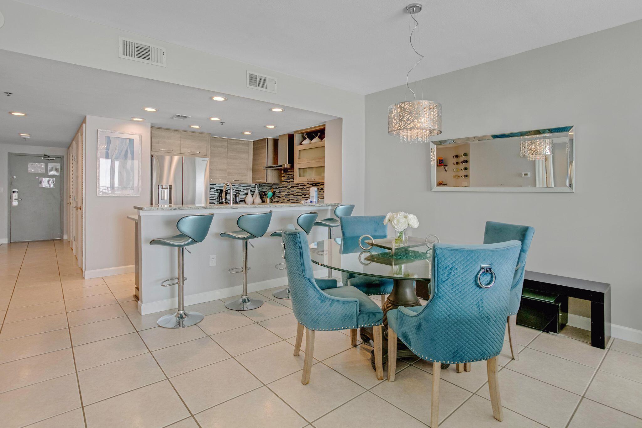Come see the Amazing Gulf & Beach views from this recently renovated 10th Floor condo. Fully furnished and turnkey, this beach get-away has a contemporary flair with beautiful Granite countertops in the kitchen, custom soft-closed cabinetry and stainless-steel appliances. Tile flooring in the kitchen, dining & living room add to low maintenance, and the unit was just repainted Thanksgiving week 2023. Hugh 25' balcony accessed by the master bedroom and the living room. Additionally, this condo comes with a very desirable storage unit (#9) which is located in the parking garage. Also just upgraded is a new 80 inch TV in the living room, new king & furniture in the guest room,  new dryer, and a new tile backsplash in the kitchen.  Sterling Shores is part of a 8+ acre gated community