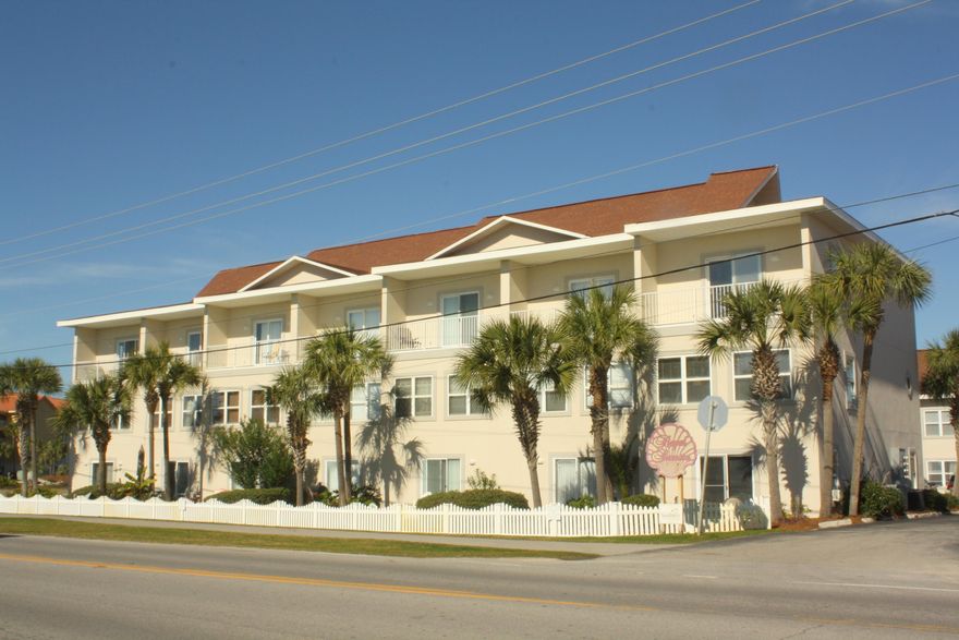 Looking for a large, updated unit, just steps to the beach? Rare opportunity to own a 4BD/4BA renovated unit with a garage! Residences at Royal Seaesta don't become available often! Perfect as a primary residence, second home or investment property with excellent income potential, with 2480 square feet of living space and situated directly across the street from the Gulf. Offering two master bedrooms and two additional bedrooms, each with their own baths. Just renovated with new granite counters and new carpet in three bedrooms, freshly painted. The second master is first level, with separate entrance providing flexibility and could be rented out separately. Additional features include 9 foot ceilings, tiled floors (except 3 BD). Rental ready! Great location,