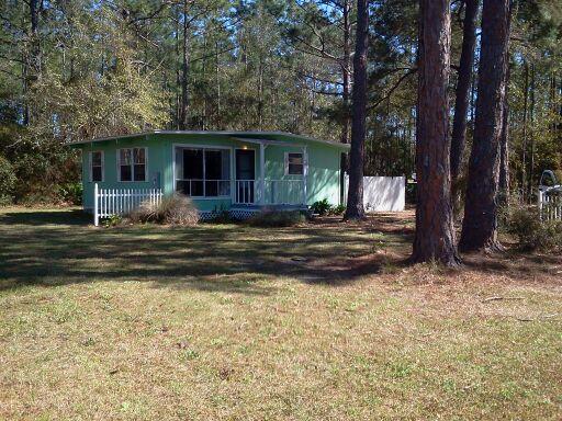 CHARMING COTTAGE IN THE PINES - EXPOSED BEAM TONGUE & GROOVE WOOD CEILINGS... W/D HOOKUPS.. NO PETS!!!... 2 BEDROOM/1 BATH - VERY PRIVATE... PUBLIC PARK ON BAY @ END OF STREET... 1ST, LAST & DEPOSIT... APPLICATIONS REQUIRED W/REFERENCES - CONTACT OWNER/BROKER FOR APPOINTMENTS!
